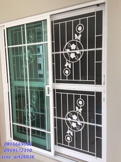 เหล็กดัดพร้อมมุ้งลวด ดอกไม้วงกลม