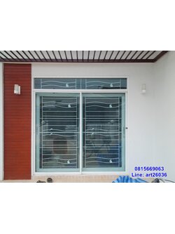 เหล็กดัดพร้อมมุ้งลวด ประตูบานเลื่อน ลายโลมาและเรือใบ