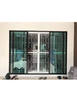 เหล็กดัดพร้อมมุ้งลวด กระจกสี บานเลื่อน สวยๆ