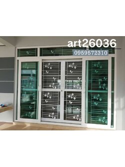 เหล็กดัดอบสีขาวผีเสื้อ พร้อมมุ้งลวด กระจกสีทะเล กระจกบานเลื่อน