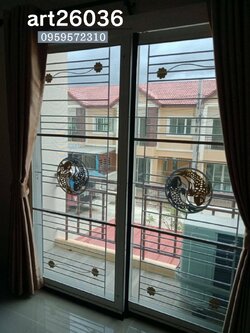 เหล็กดัดพร้อมมุ้งลวด ลายปลาวงกลม