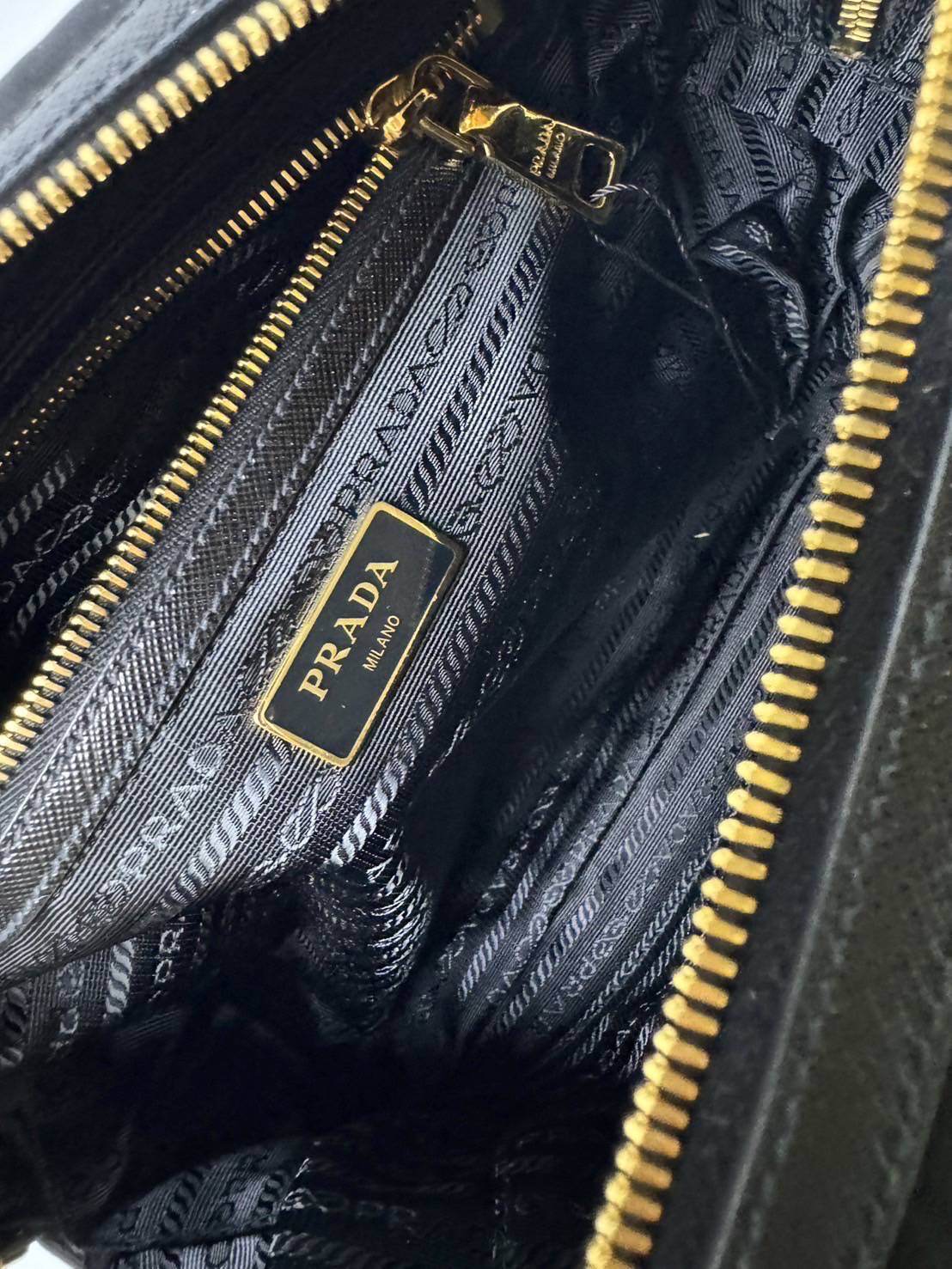 New Prada Tessuto + Saffiano Bauletto Bag • Size : 10” (L) x 7.5” (H) x 3.5” (D)