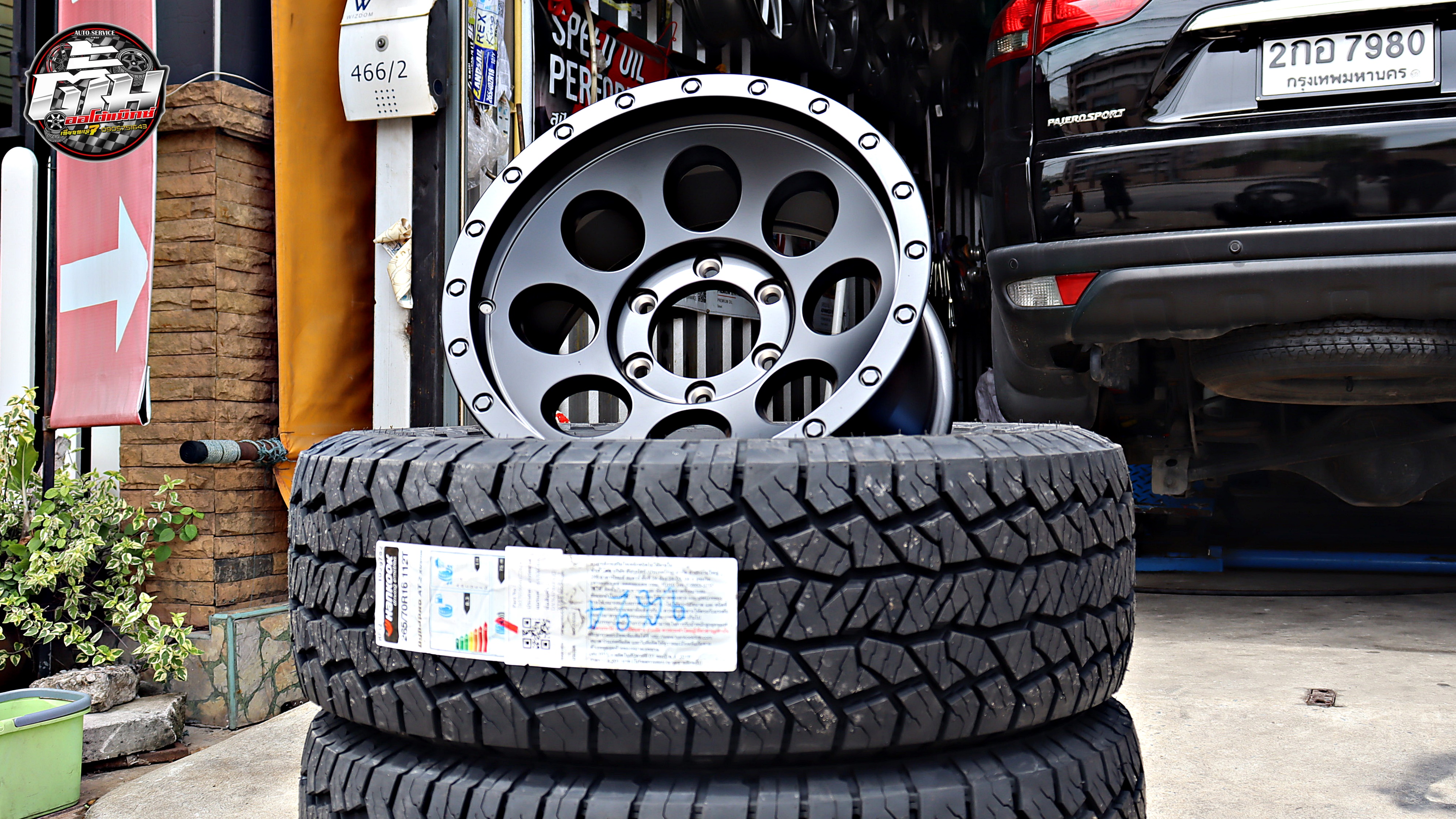 MITSUBISHI PAJERO SPORT เปลี่ยนล้อยาง ล้อ ZEUS-25 ขอบ16นิ้ว ยาง HANKOOK Dynapro AT2 Xtreme 265/70R16 112T