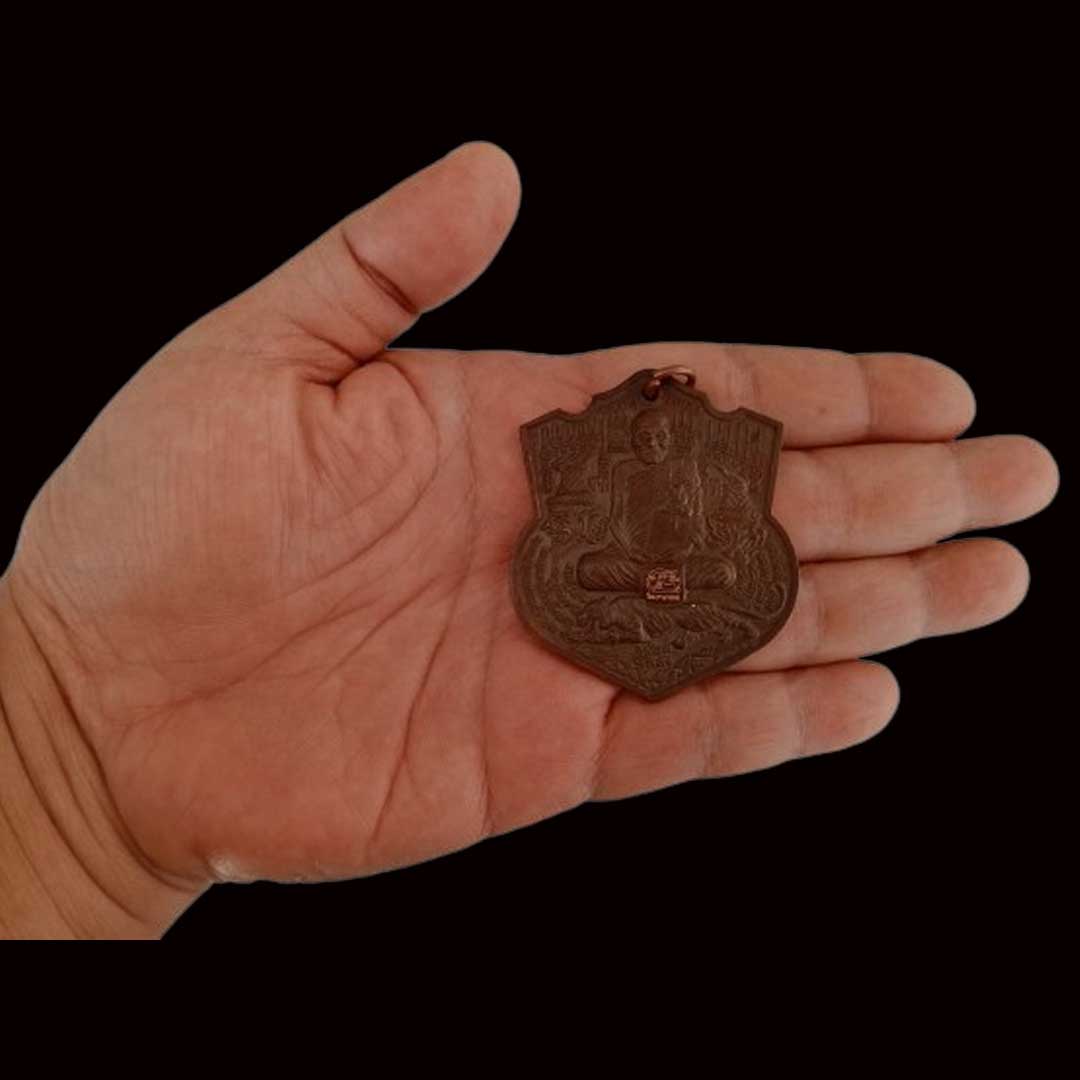 เหรียญพยัคฆ์ 5 พลัง หลวงปู่กาหลง เขี้ยวแก้ว ปี 2551 เนื้อทองแดง หมายเลข 4295