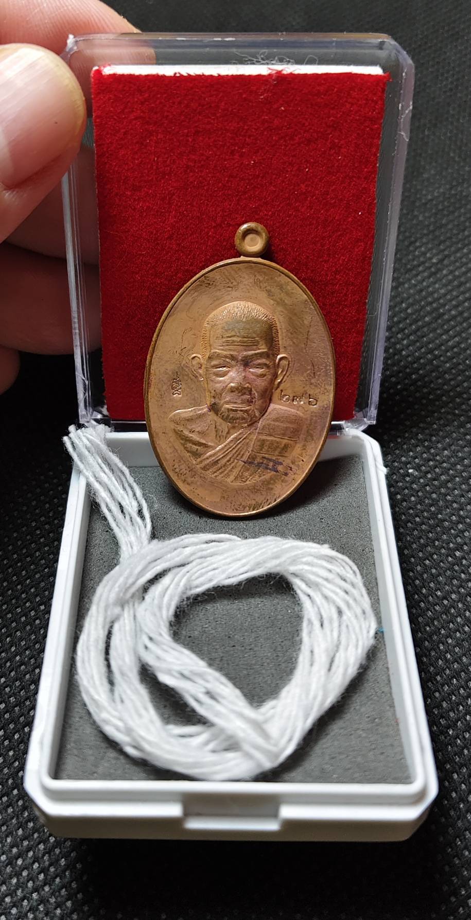 เหรียญคุ้มภัย หลวงปู่สิงห์โต สำนักสงฆ์ป่าทรงธรรม จ.อุบลราชธานี ปี 2568 เนื้อทองแดงผิวไฟ เลข 276