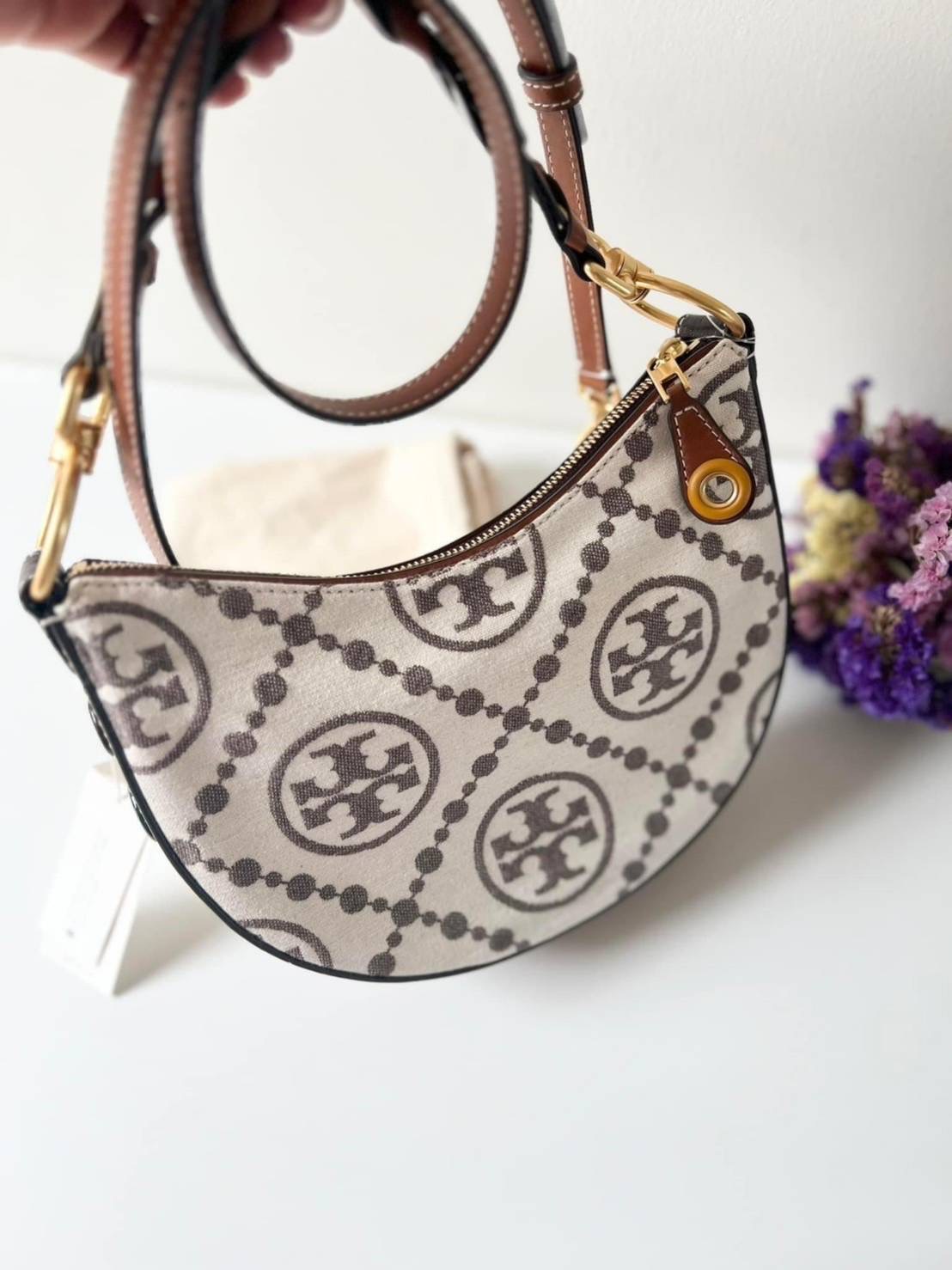 NEW TORY BURCH T MONOGRAM GROMMET MINI CRESCENT BAG SZ.Height: 7.9" (20cm); length: 9.8" (25cm); depth: 2" (5cm)
