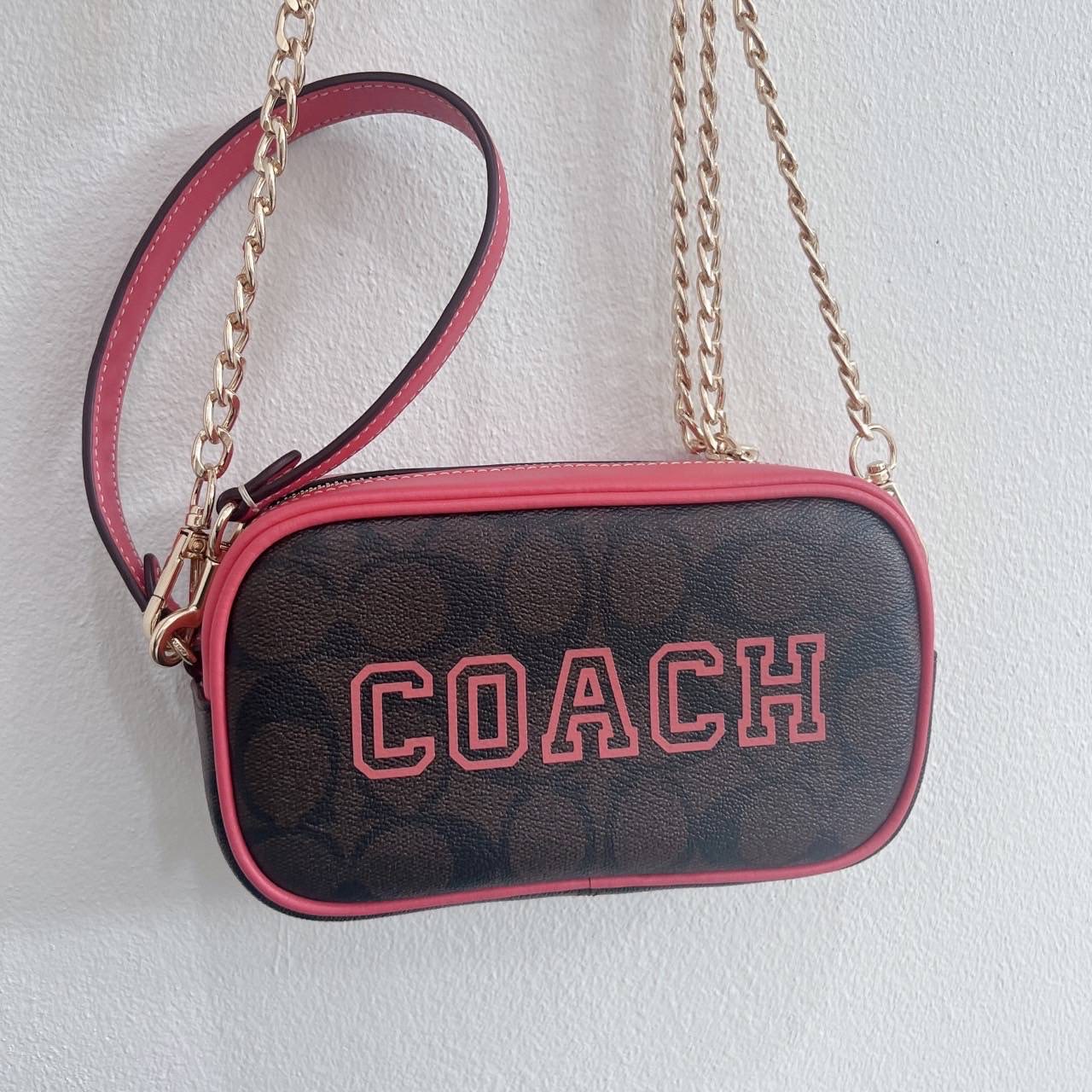 New Coach Jamie Wristlet In Signature Canvas With Varsity Motif / 7" (L) x 4" (H) x 2" (W)