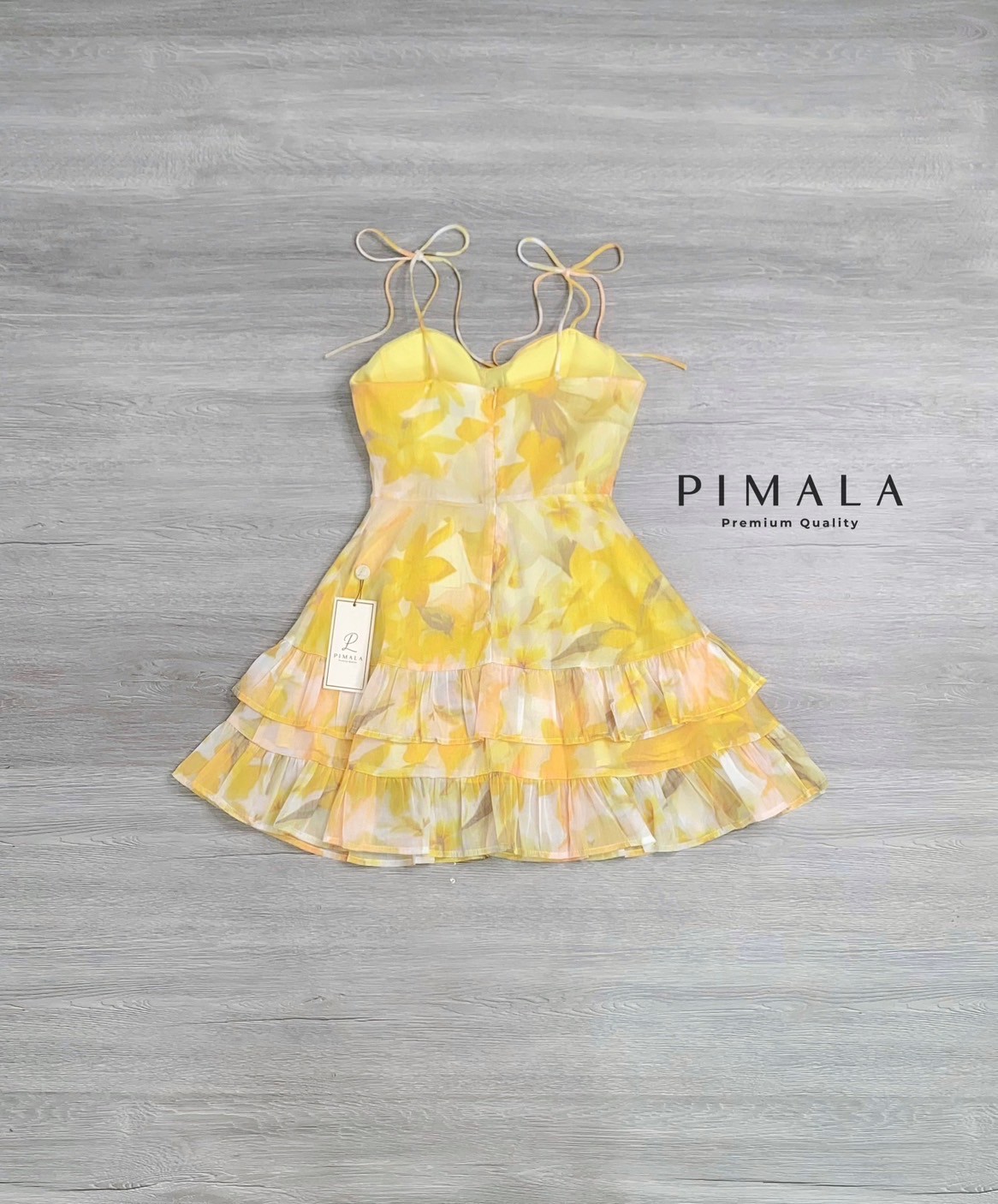 เดรสสายเดี่ยวผูกโบว์ปรับระดับได้เลยน้า (เหลือง)