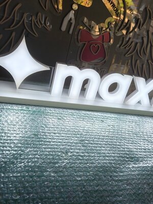 อักษรไฟออกหน้า '' MAXBIT ''